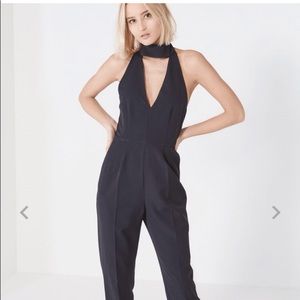 Black keyhole high neck deep plunge jumpsuit